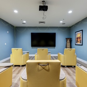 Movie theater with yellow chairs