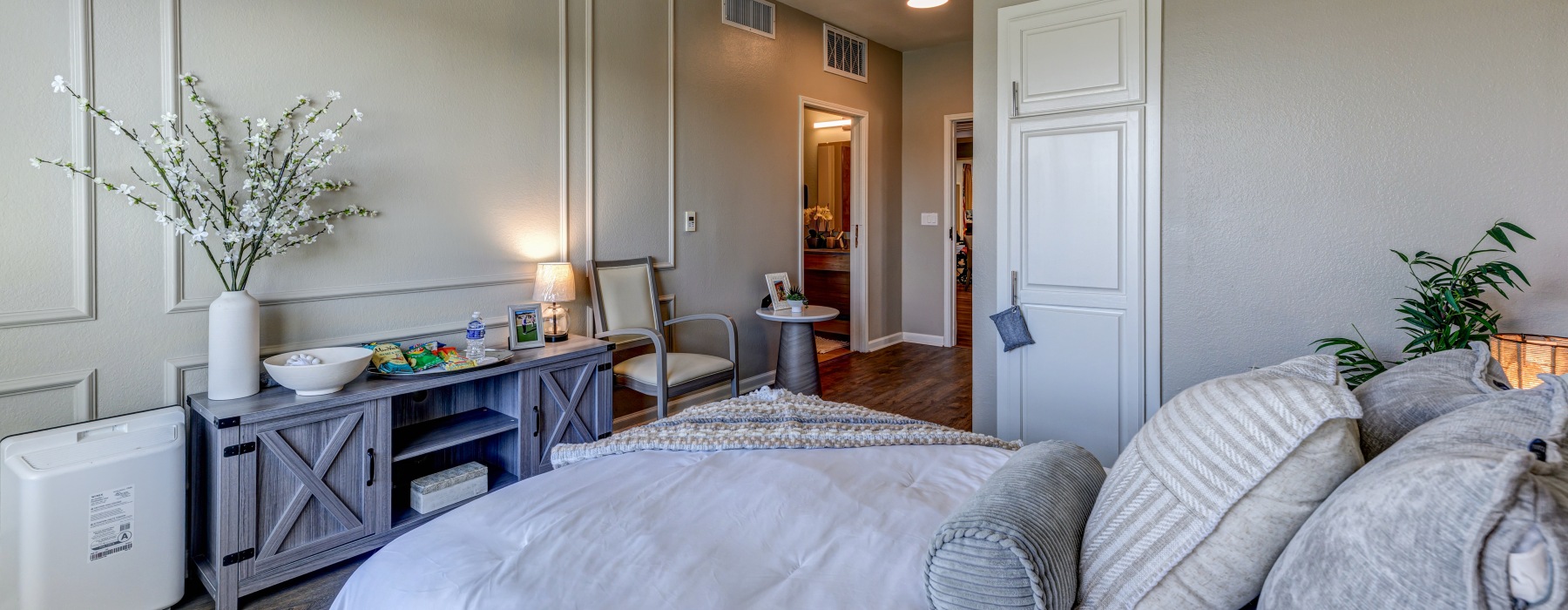 cozy bedroom with bed and dresser