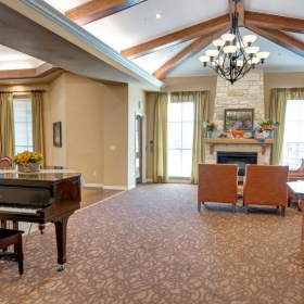 Access to resident-only features clubhouse with grand piano and fireplace seating